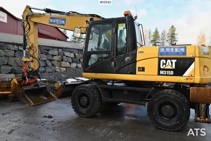 2012 Cat 315D tilt rotator and one bucket