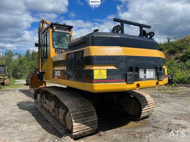 2002 Caterpillar 345B gravemaskin m/ Langbom og graveskuffe 